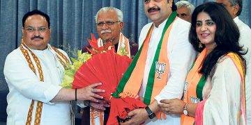 New Delhi: Former Congress leader Kuldeep Bishnoi and his wife Renuka meet BJP National President JP Nadda after joining the Bharatiya Janata Party, at his residence in New Delhi, Thursday, Aug. 4, 2022. Haryana CM Manohar Lal is also seen. Tribune Photo: Mukesh Aggarwal