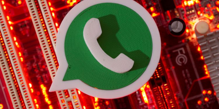 FILE PHOTO: A 3D printed Whatsapp logo is placed on a computer motherboard in this illustration taken January 21, 2021. REUTERS/Dado Ruvic/Illustration