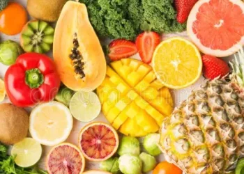 vitamin-c-fruits-vegetables-rich-arranged-rectangle-oranges-mango-grapefruit-kiwi-kale-pepper-pineapple-lemon-sprouts-120492615