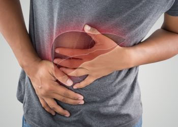The Photo Of Liver On Man's Body Against Gray Background, Hepatitis, Concept with Healthcare And Medicine